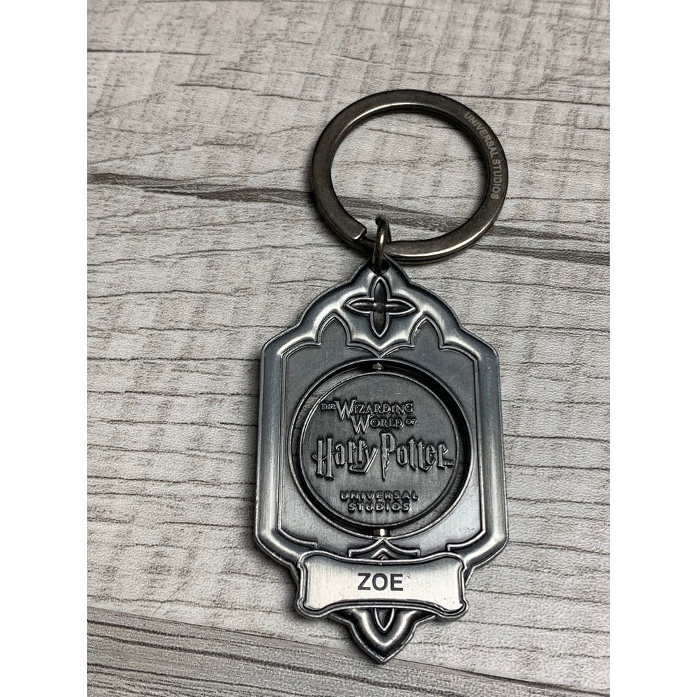 Universal Studios Harry Potter Spinning Hogwarts Keychain Zoe Nameplate Pewter